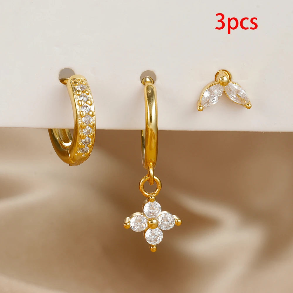 Lot de 3 Boucles d'oreilles pendantes en Zircon Vert   
Piercing pour cartilage ou lobe  
Acier inoxydable de haute qualité (hypoallergénique et résistant à la corrosion)  
Zircon vert étincelant pour un effet élégant et raffiné  
Moderne.