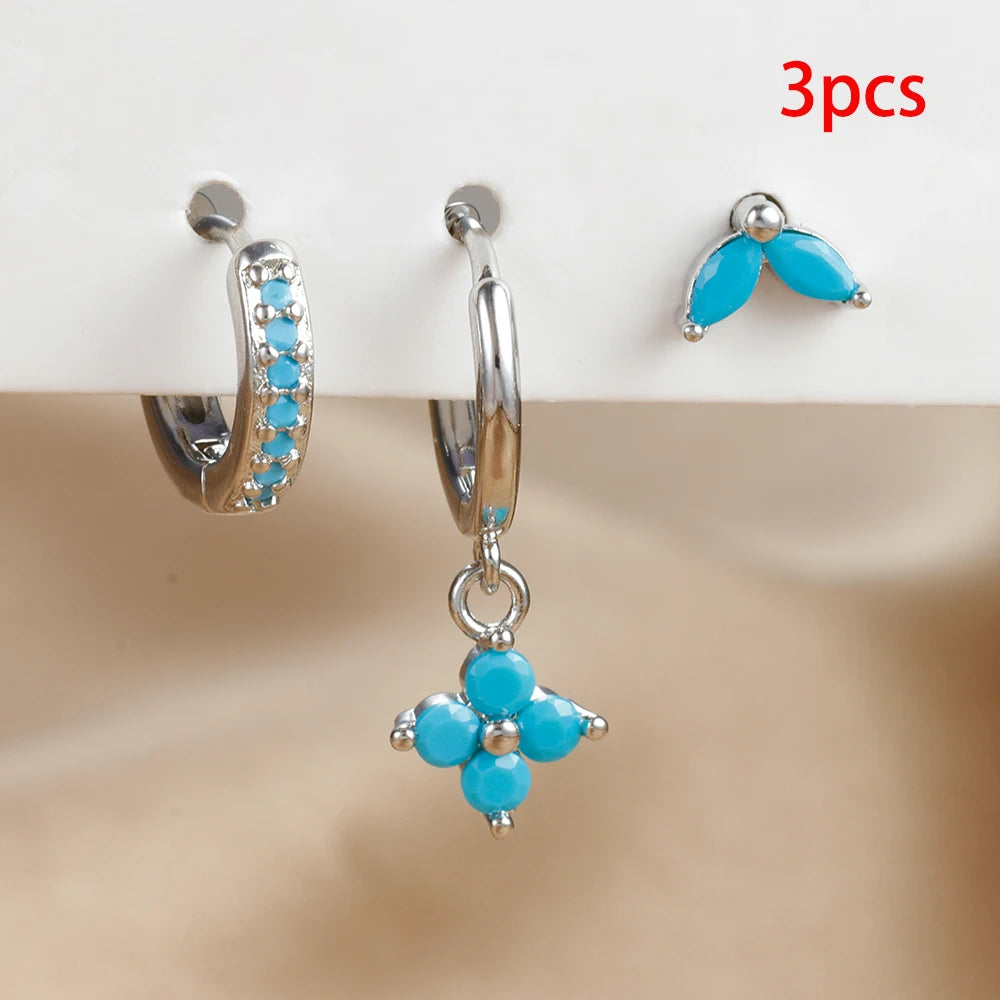 Lot de 3 Boucles d'oreilles pendantes en Zircon Vert   
Piercing pour cartilage ou lobe  
Acier inoxydable de haute qualité (hypoallergénique et résistant à la corrosion)  
Zircon vert étincelant pour un effet élégant et raffiné  
Moderne.